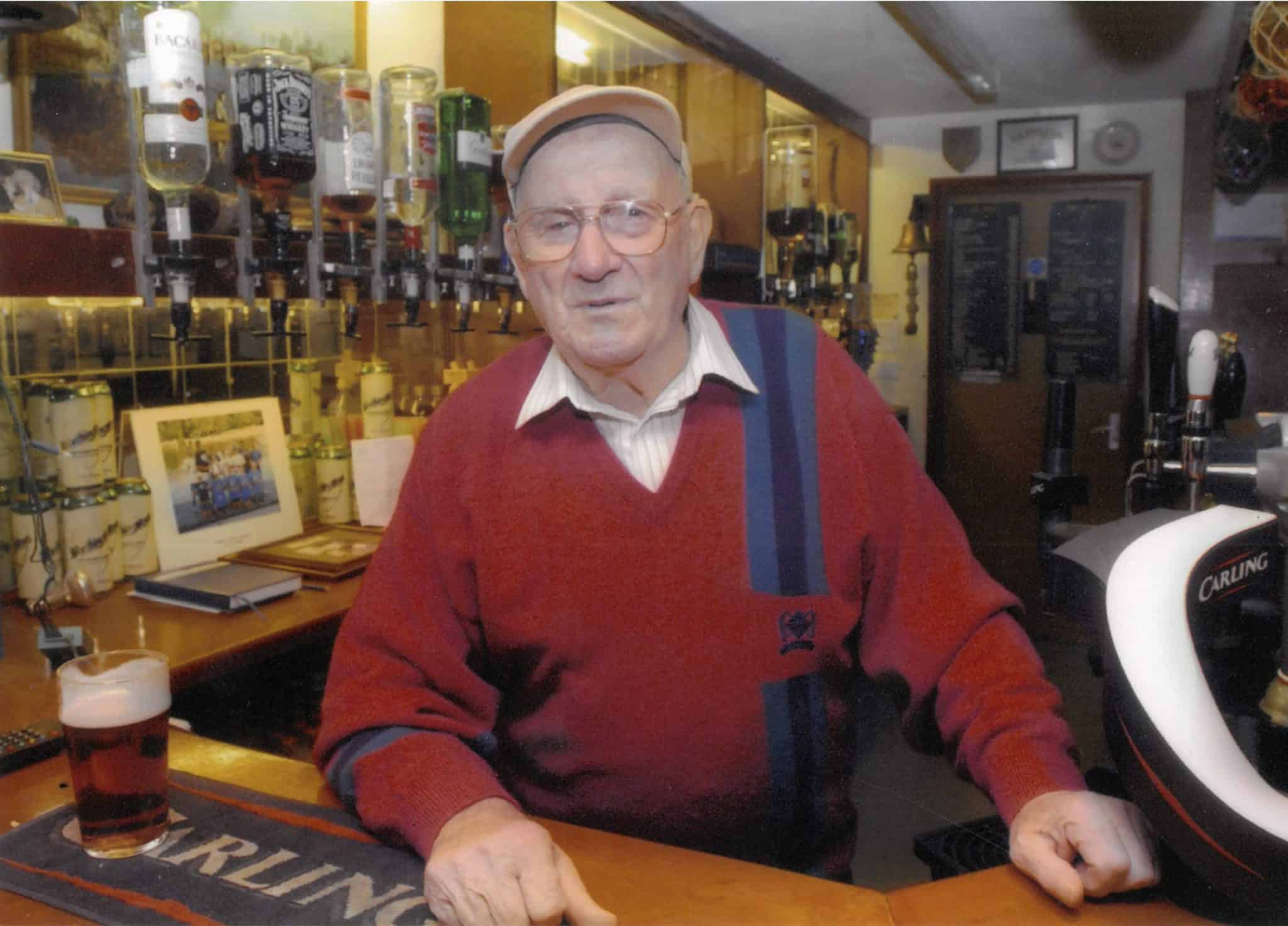 Paddy O'Brien behind the bar cropped Paddy O'Brien behind the bar cropped
