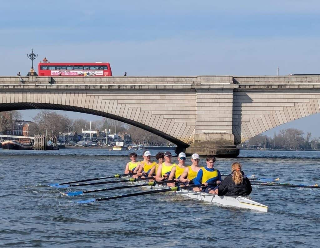 Peterborough’s junior boys eight training on the Tideway in London below the iconic Putney Bridge at the start of the Boat Race course.